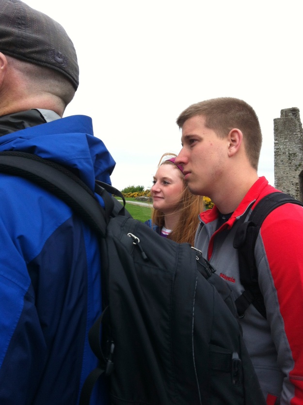 At the top of the castle- listening to guide.